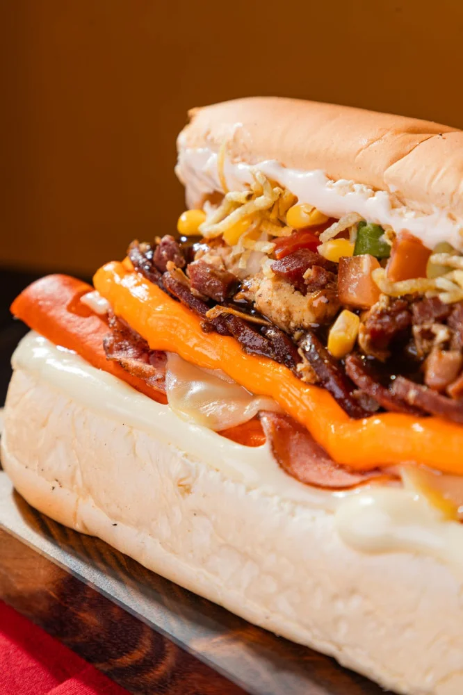 Na compra de um lanche individual, ganhe outro de igual ou menor valor