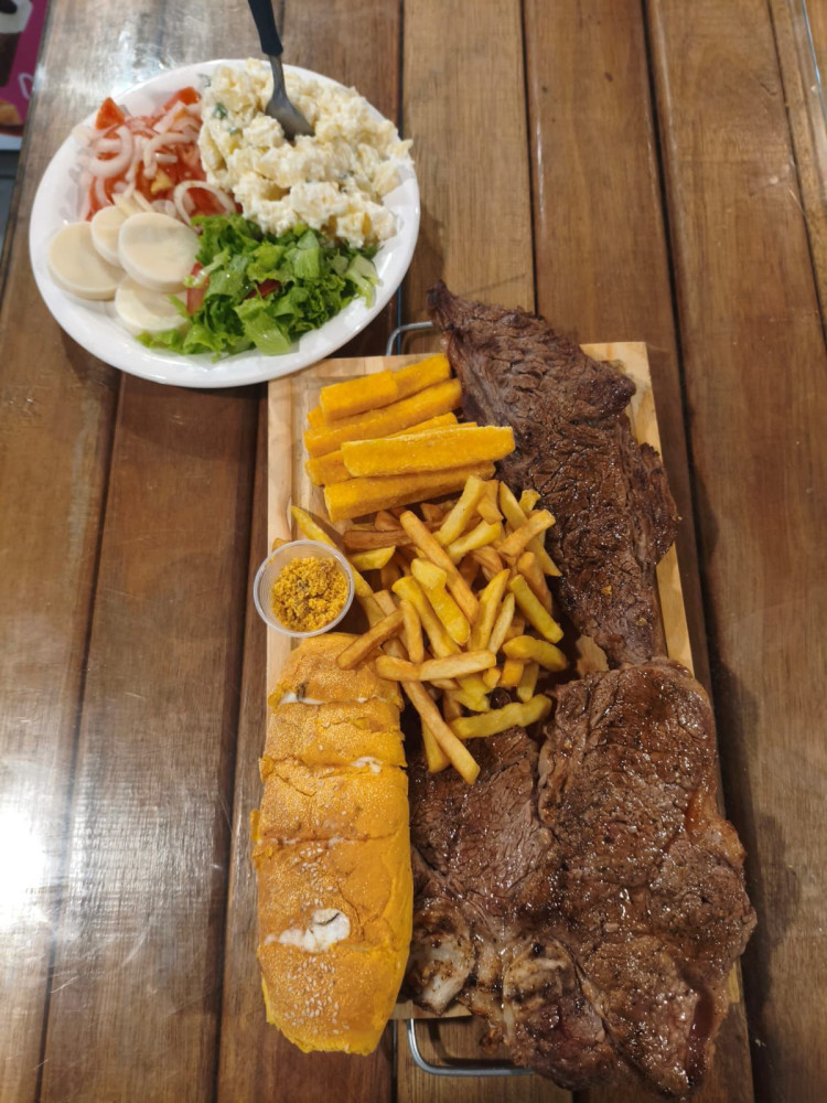 Na compra de uma alcatra na tábua com acompanhamentos, ganhe 50% de desconto