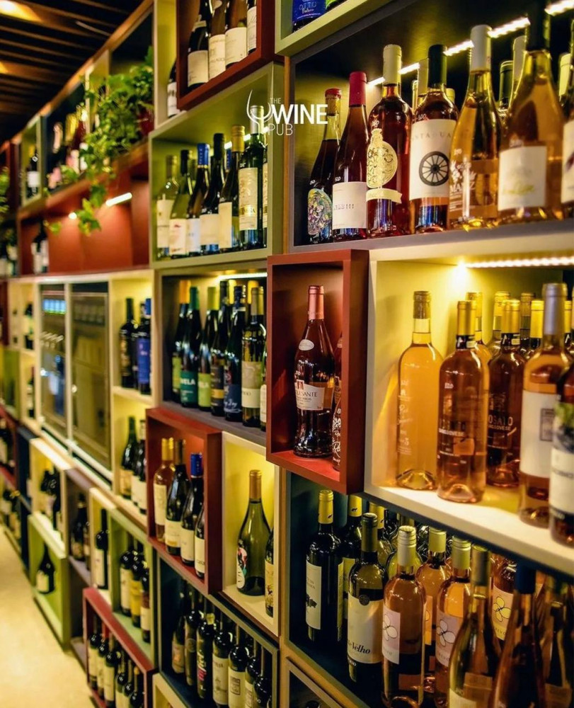 Na compra de uma garrafa de vinho, ganhe 50% de desconto na segunda garrafa de igual ou menor valor