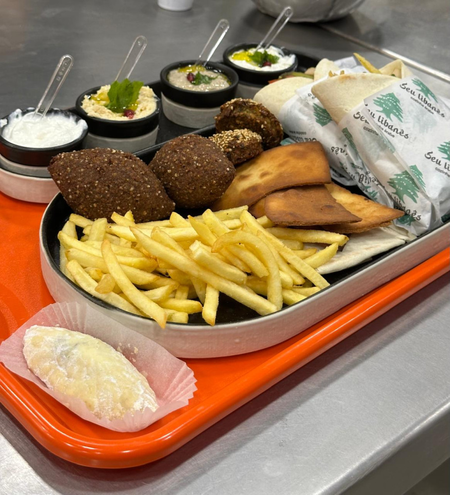 Na compra de um prato para compartilhar, ganhe 50% de desconto