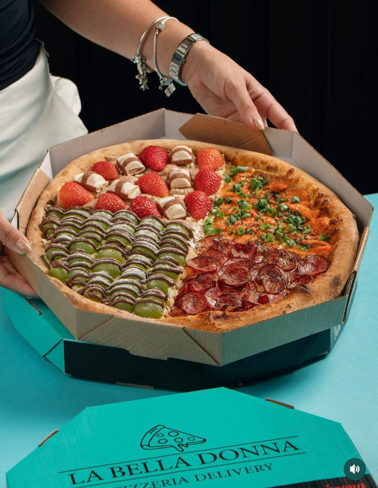 Na compra de uma pizza, ganhe 50% de desconto [Sabores selecionados]