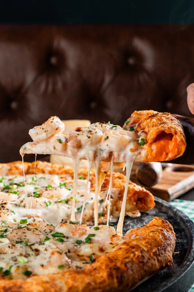 Na compra de uma pizza, ganhe 50% de desconto